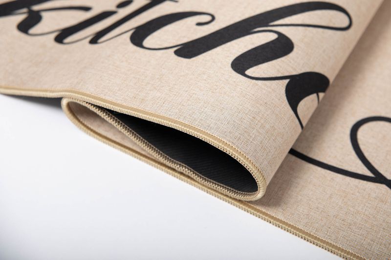 שטיח למטבח דגם טנסי עשוי בד בשילוב גומי עם כיתוב KITCHEN