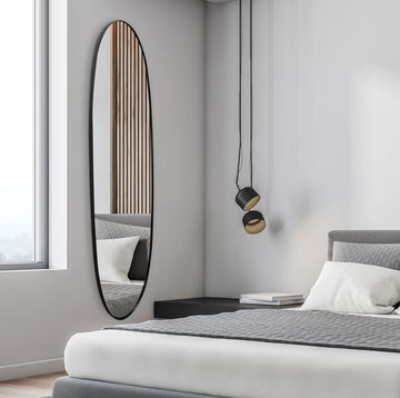 מראת קיר אובלית מעוצבת מסגרת בצבע שחור 150X40X2 ס"מ